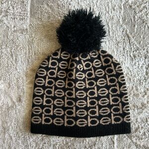 Black and brown Bebe pom pom beanie
